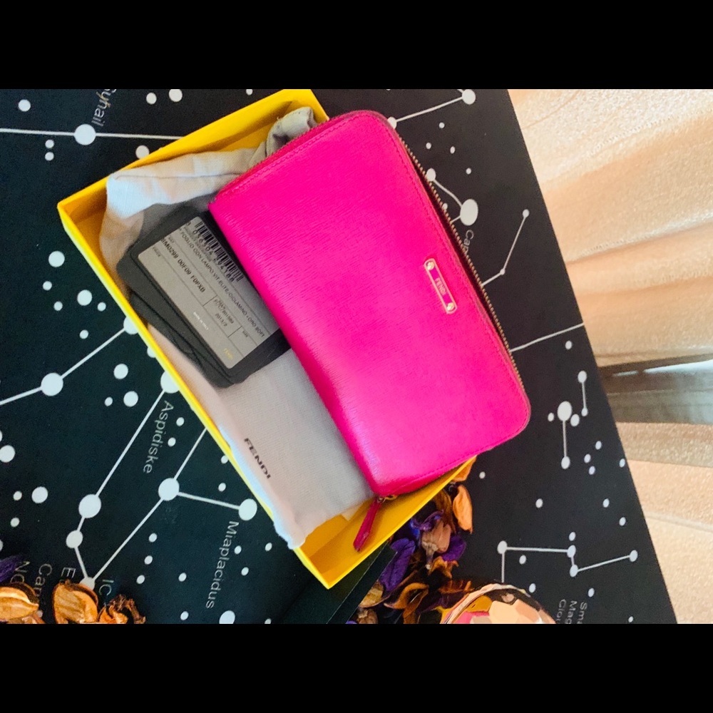 Fendi Zippy Textured Wallet for women.